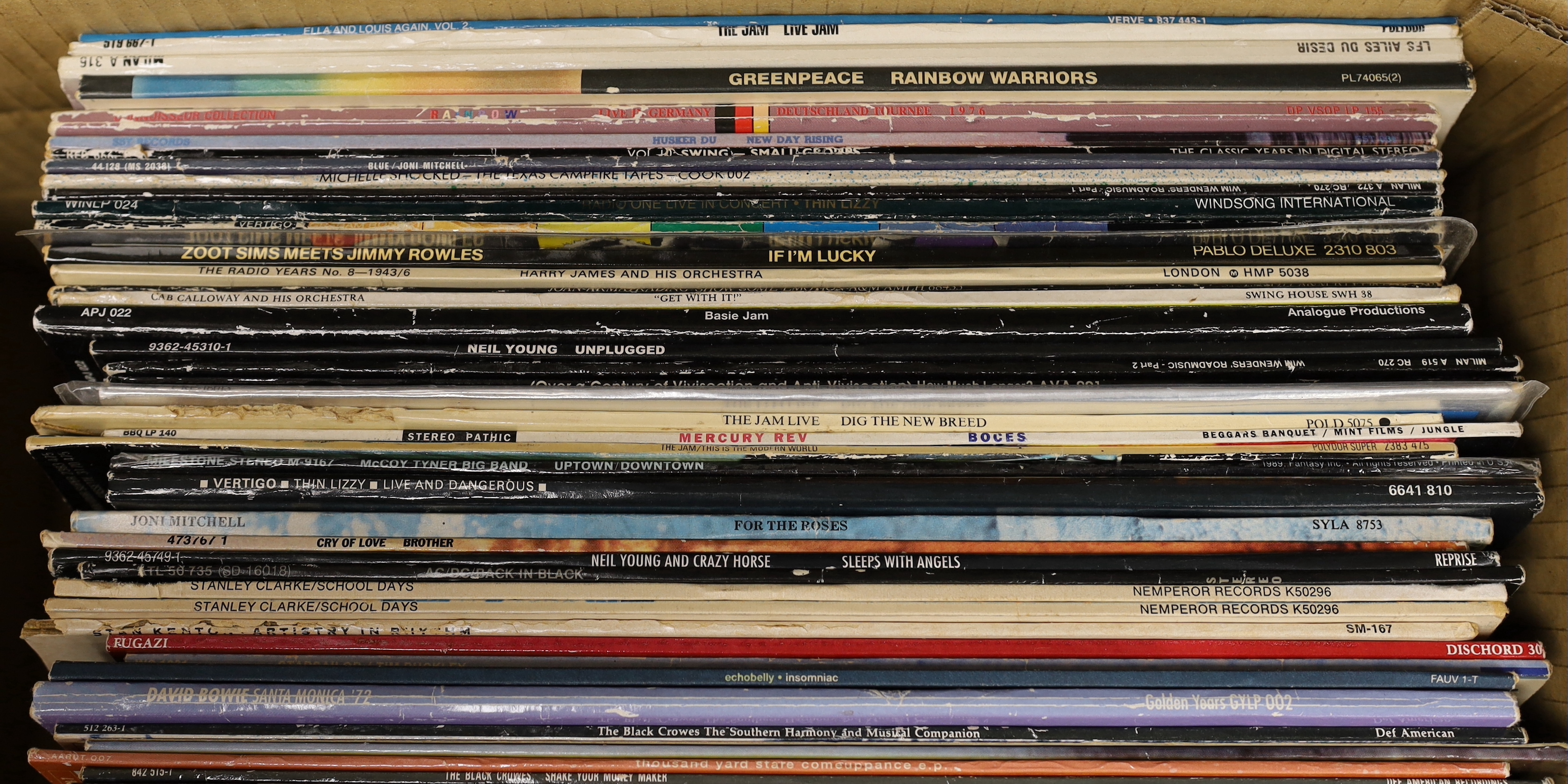 Fifty-five mainly 80's and 90's LPs, including, The Jam, Joan Armatrading, Neil Young, Mercury Rev, Thin Lizzy, Joni Mitchell, AC/DC, David Bowie, The Carpenters, Alice In Chains, etc
